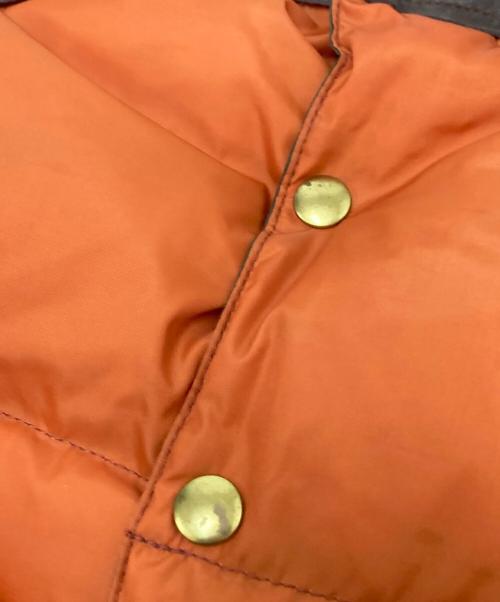 Rocky Mountain FeatherBed（ロッキーマウンテンフェザーベッド）Rocky Mountain FeatherBed (ロッキーマウンテンフェザーベッド) WAREHOUSE (ウエアハウス) ダウンベスト オレンジ×ブラウン サイズ:Mの古着・服飾アイテム