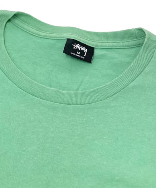 stussy（ステューシー）stussy (ステューシー) インターナショナルプリントTシャツ グリーン サイズ:Mの古着・服飾アイテム