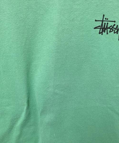 stussy（ステューシー）stussy (ステューシー) インターナショナルプリントTシャツ グリーン サイズ:Mの古着・服飾アイテム