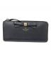 Kate Spade（ケイトスペード）の古着「ラウンドジップウォレット」｜ブラック