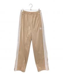 adidas（アディダス）の古着「アディカラー クラシックス ファイヤーバード トラックパンツ」｜ベージュ