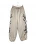 NOT4NERD（ノットフォーナード）の古着「Dagger Tribal Logo Incision Sweat Pants」｜ベージュ