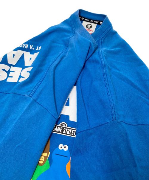 Aape BY A BATHING APE（エーエイプ バイ アベイシングエイプ）Aape BY A BATHING APE (エーエイプ バイ アベイシングエイプ) SESAME STREET (セサミストリート) プリントTシャツ ブルー サイズ:XLの古着・服飾アイテム
