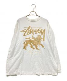 stussy（ステューシー）の古着「ライオンプリントロングスリーブTシャツ」｜ホワイト