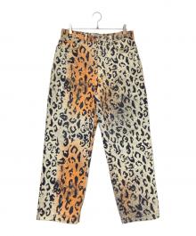 stussy（ステューシー）の古着「STENCIL CANVAS BIG OL JEANS」｜オレンジ×ベージュ