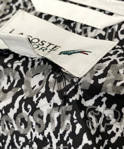 LACOSTE SPORT（ラコステスポーツ）LACOSTE SPORT (ラコステスポーツ) ナイロンジャケット ブラック×ホワイト サイズ:US:S/Mの古着・服飾アイテム