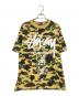 A BATHING APE（アベイシングエイプ）の古着「30周年記念 1stカモ 猿迷彩 ワールドツアー Tシャツ」｜ベージュ×グリーン