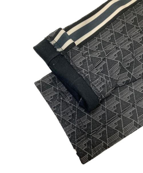 LACOSTE（ラコステ）LACOSTE (ラコステ) サイドテーピングモノグラムジャカードトラックパンツ ブラック×グレー サイズ:US:XSの古着・服飾アイテム