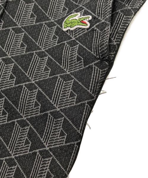 LACOSTE（ラコステ）LACOSTE (ラコステ) サイドテーピングモノグラムジャカードトラックパンツ ブラック×グレー サイズ:US:XSの古着・服飾アイテム