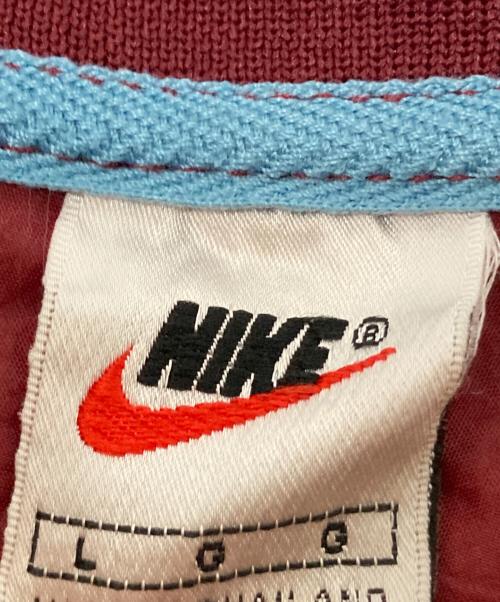 NIKE（ナイキ）NIKE (ナイキ) Vネックナイロンプルオーバー レッド サイズ:Lの古着・服飾アイテム