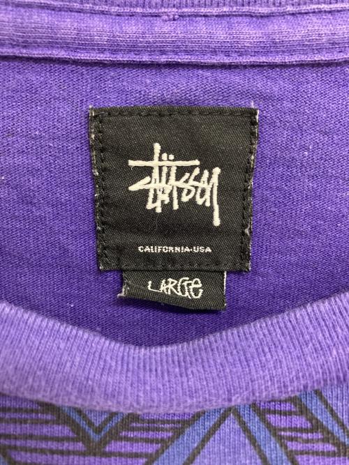 stussy（ステューシー）stussy (ステューシー) TOMTOM柄Tシャツ パープル サイズ: Lの古着・服飾アイテム