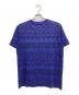stussy（ステューシー）の古着「TOMTOM柄Tシャツ」｜パープル