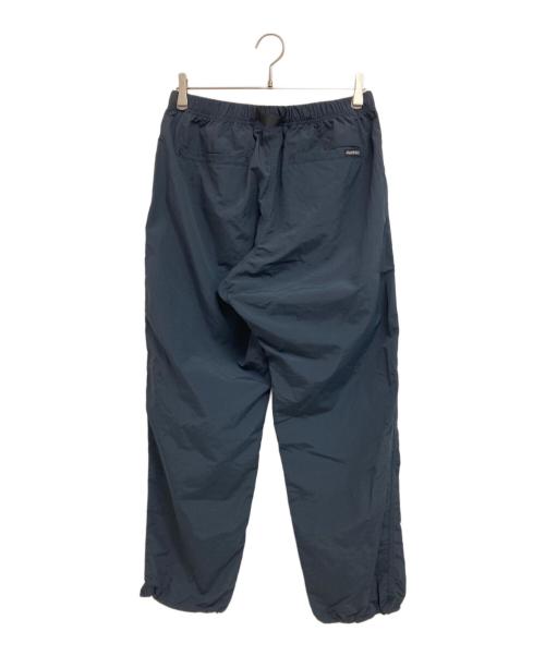 GRAMICCI（グラミチ）GRAMICCI (グラミチ) LOWERCASE (ロウワーケース) NYLON PACKABLE TRACK PANTS ネイビー サイズ: Lの古着・服飾アイテム