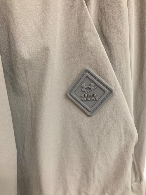 UNDER ARMOUR（アンダーアーマー）UNDER ARMOUR (アンダーアーマー) UNITED ARROWS (ユナイテッドアローズ) ナイロンカーゴパンツ ベージュ サイズ:Mの古着・服飾アイテム
