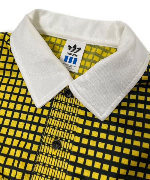 adidas（アディダス）adidas (アディダス) ポロシャツ ブラック×イエロー サイズ:Mの古着・服飾アイテム