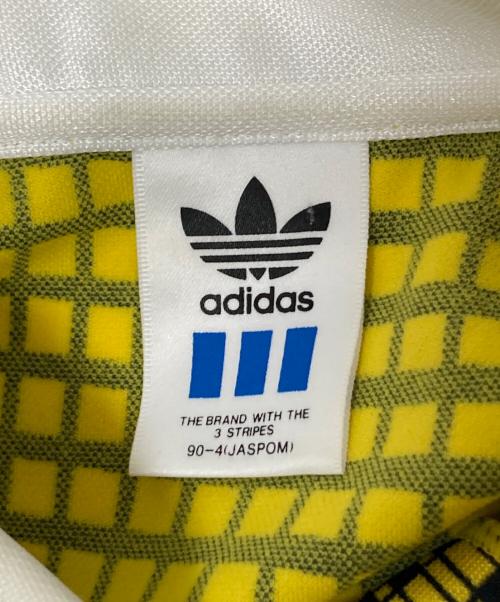 adidas（アディダス）adidas (アディダス) ポロシャツ ブラック×イエロー サイズ:Mの古着・服飾アイテム