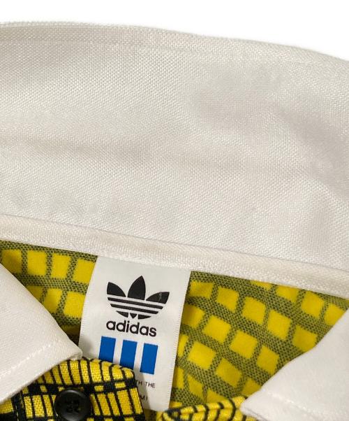 adidas（アディダス）adidas (アディダス) ポロシャツ ブラック×イエロー サイズ:Mの古着・服飾アイテム