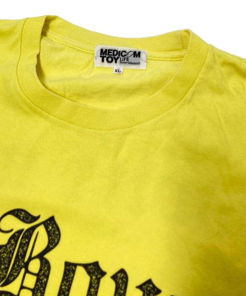 MEDICOM TOY LIFE ENTERTAINMENT（メディコムトイ・ライフエンターテイメント）MEDICOM TOY LIFE ENTERTAINMENT (メディコムトイ・ライフエンターテイメント) プリントTシャツ イエロー×ブラック サイズ:XLの古着・服飾アイテム