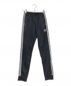 adidasアディダス）の古着「アディカラー クラシックス SST トラックパンツ」｜ブラック×ホワイト