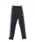 adidas（アディダス）の古着「アディカラー クラシックス SST トラックパンツ」｜ブラック×ホワイト