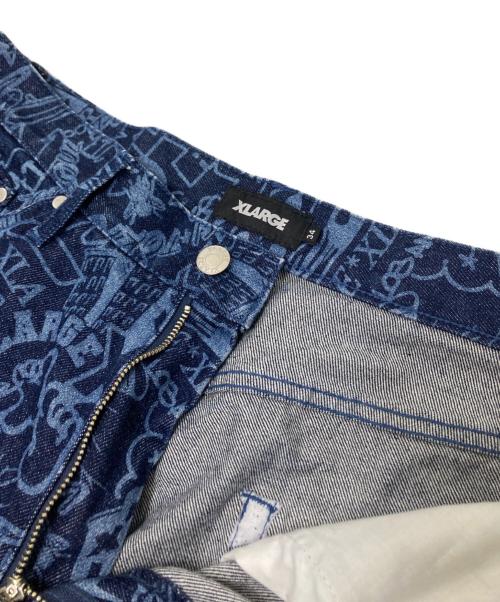 X-LARGE（エクストララージ）X-LARGE (エクストララージ) ディスチャージプリント デニムパンツ ネイビー×ブルー サイズ:34の古着・服飾アイテム