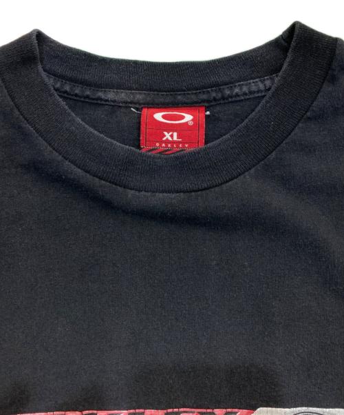 OAKLEY（オークリー）OAKLEY (オークリー) プリントTシャツ  赤タグ 90’s -00‘s ブラック サイズ:XLの古着・服飾アイテム