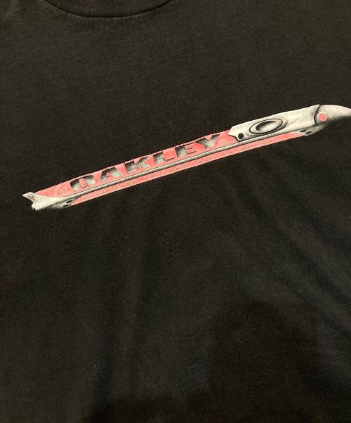 OAKLEY（オークリー）OAKLEY (オークリー) プリントTシャツ  赤タグ 90’s -00‘s ブラック サイズ:XLの古着・服飾アイテム
