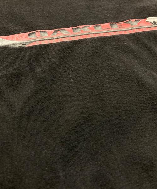 OAKLEY（オークリー）OAKLEY (オークリー) プリントTシャツ  赤タグ 90’s -00‘s ブラック サイズ:XLの古着・服飾アイテム