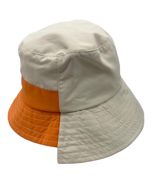 J.W.ANDERSON（ジェイダブリューアンダーソン）J.W.ANDERSON (ジェイダブリューアンダーソン) バイカラーハット ホワイト×オレンジの古着・服飾アイテム