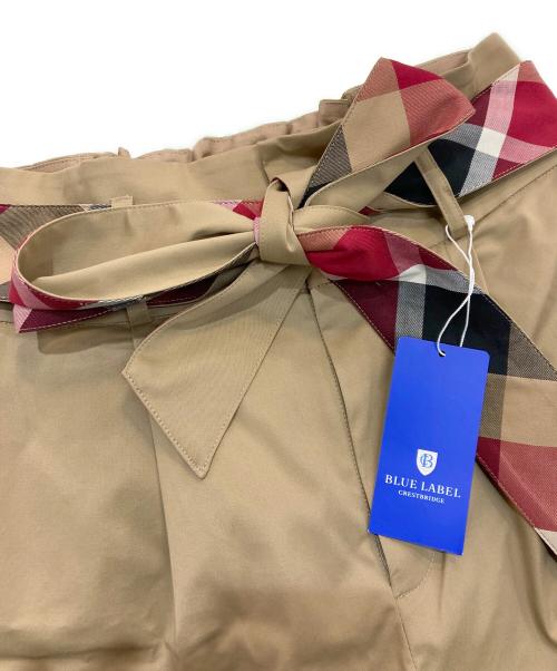 BLUE LABEL CRESTBRIDGE（ブルーレーベルクレストブリッジ）BLUE LABEL CRESTBRIDGE (ブルーレーベルクレストブリッジ) チェックベルトワイドパンツ ベージュ サイズ:M 未使用品の古着・服飾アイテム
