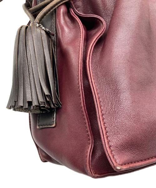 LOEWE MADRID（ロエベ）LOEWE MADRID (ロエベ) フラメンコ 28 巾着 ナッパレザー タッセル ショルダーバッグ ボルドーの古着・服飾アイテム