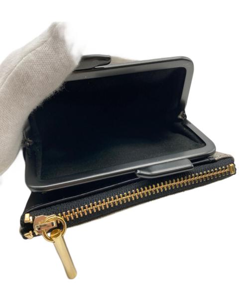 pomtata（ポンタタ）pomtata (ポンタタ) 2つ折り財布 ブラック×シルバーの古着・服飾アイテム