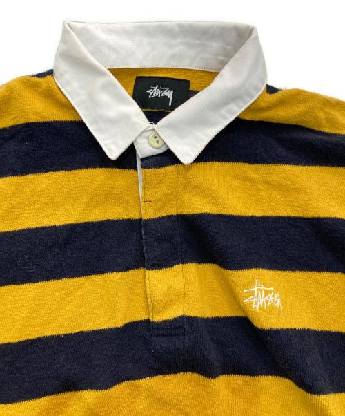 stussy（ステューシー）stussy (ステューシー) ラガーシャツ イエロー×ブラック サイズ:Sの古着・服飾アイテム