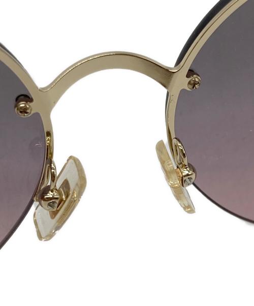 MIU MIU（ミュウミュウ）MIU MIU (ミュウミュウ) フェイクパール ラインストーンサングラス パープル サイズ:60口18の古着・服飾アイテム