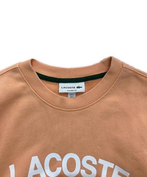 LACOSTE（ラコステ）LACOSTE (ラコステ) ビッグクロックカレッジロゴクルーネックスウェット トレーナー　SH9689 オレンジ サイズ:3の古着・服飾アイテム