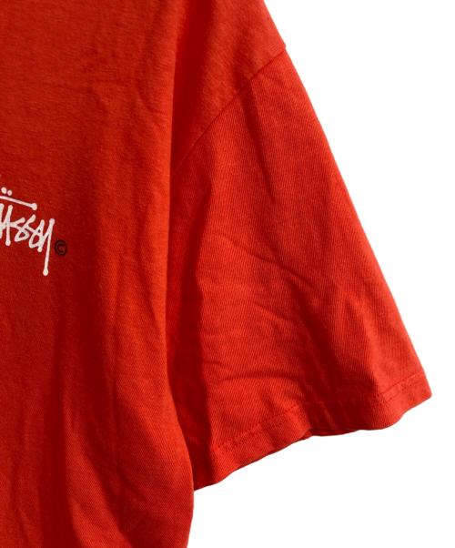 stussy（ステューシー）stussy (ステューシー) プリントTシャツ オレンジ サイズ:Mの古着・服飾アイテム