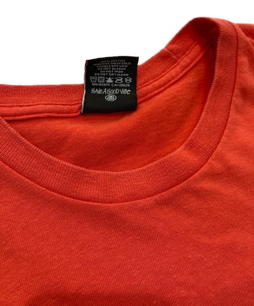 stussy（ステューシー）stussy (ステューシー) プリントTシャツ オレンジ サイズ:Mの古着・服飾アイテム
