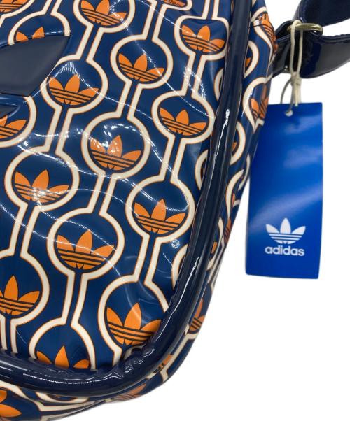 adidas Originals（アディダスオリジナル）adidas originals (アディダスオリジナル) モノグラムプリント エアライナーバッグ ネイビー×オレンジの古着・服飾アイテム