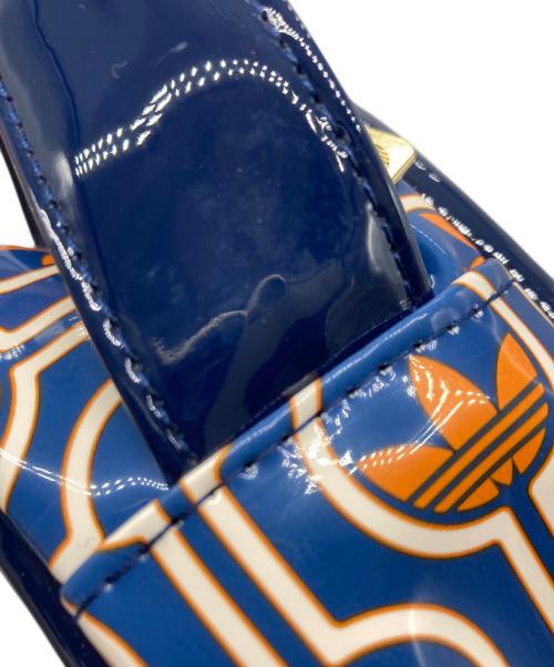 adidas Originals（アディダスオリジナル）adidas originals (アディダスオリジナル) モノグラムプリント エアライナーバッグ ネイビー×オレンジの古着・服飾アイテム