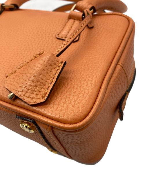 Accessoires De Mademoiselle（アクセソワ・ドゥ・マドモアゼル）Accessoires De Mademoiselle (アクセソワ・ドゥ・マドモアゼル) ハンドバッグ オレンジの古着・服飾アイテム