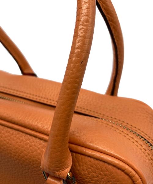 Accessoires De Mademoiselle（アクセソワ・ドゥ・マドモアゼル）Accessoires De Mademoiselle (アクセソワ・ドゥ・マドモアゼル) ハンドバッグ オレンジの古着・服飾アイテム