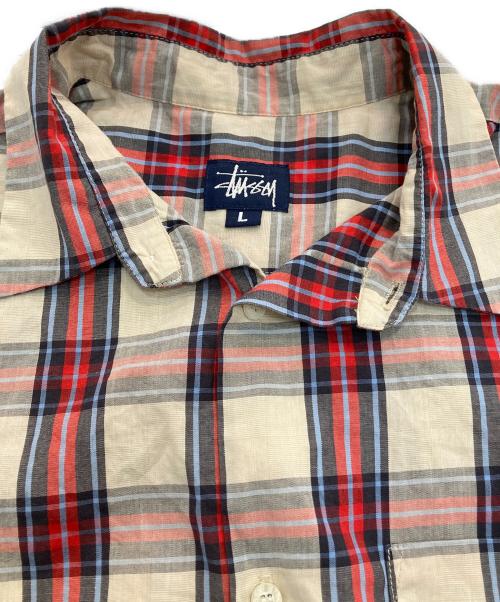 stussy（ステューシー）stussy (ステューシー) 半袖シャツ　90‘S 紺タグ USA製 レッド×ベージュ サイズ:Lの古着・服飾アイテム