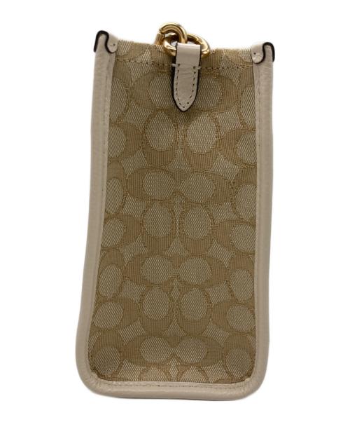COACH（コーチ）COACH (コーチ) デンプシー トート 22 シグネチャー ジャカード ウィズ ストライプ アンド コーチ パッチ ベージュの古着・服飾アイテム