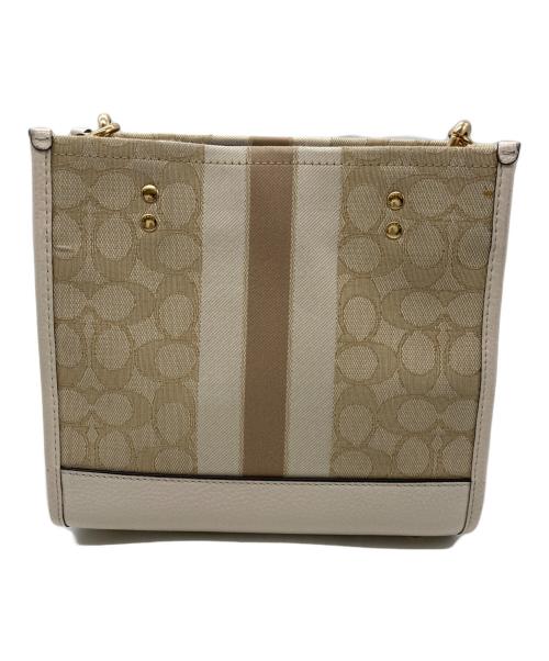 COACH（コーチ）COACH (コーチ) デンプシー トート 22 シグネチャー ジャカード ウィズ ストライプ アンド コーチ パッチ ベージュの古着・服飾アイテム