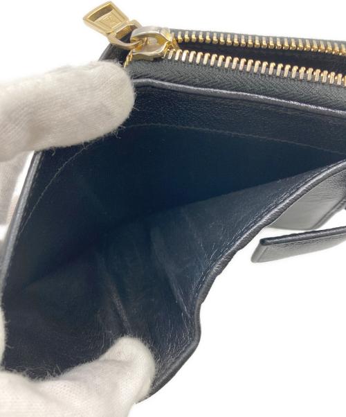 Yves Saint Laurent（イヴサンローラン）Yves Saint Laurent (イヴサンローラン) YSLロゴラウンドファスナーウォレット ブラックの古着・服飾アイテム