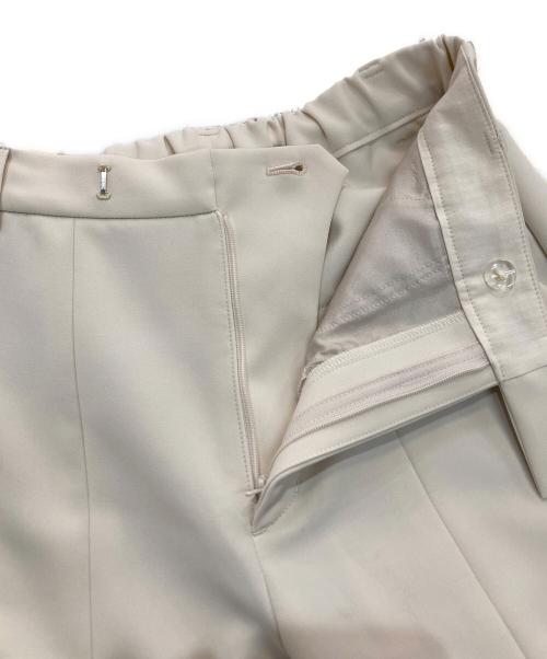 Whim Gazette（ウィムガゼット）Whim Gazette (ウィムガゼット) フロントスリットパンツ　WGZ1022102A0009 アイボリー サイズ:34の古着・服飾アイテム