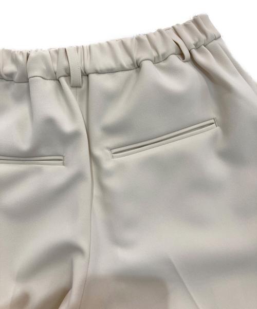 Whim Gazette（ウィムガゼット）Whim Gazette (ウィムガゼット) フロントスリットパンツ　WGZ1022102A0009 アイボリー サイズ:34の古着・服飾アイテム