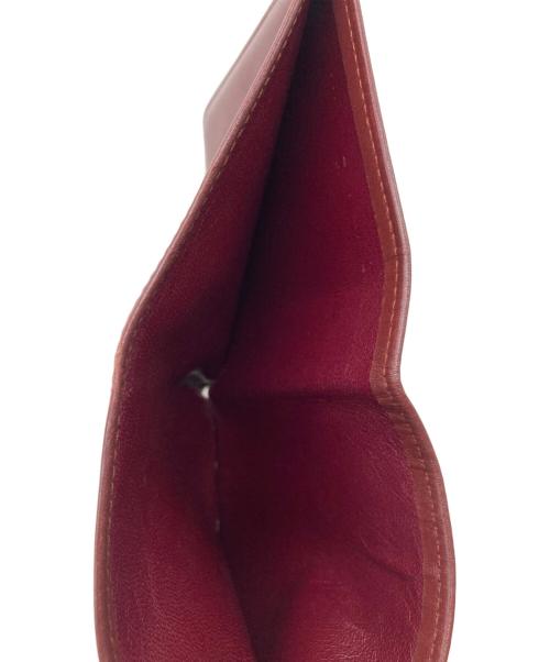 Cartier（カルティエ）Cartier (カルティエ) 札入れ レッドの古着・服飾アイテム