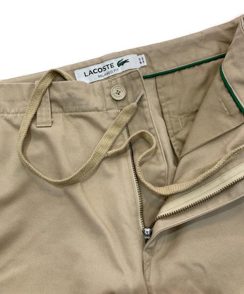 LACOSTE（ラコステ）LACOSTE (ラコステ) イージーワイドチノパンツ　HH005J ベージュ サイズ:33の古着・服飾アイテム