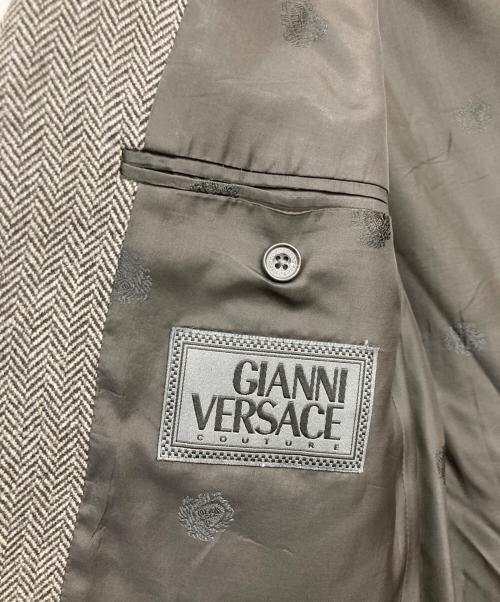 GIANNI VERSACE（ジャンニ・ヴェルサーチ）GIANNI VERSACE (ジャンニ・ヴェルサーチ) ヘリンボーンウールテーラードジャケット グレー サイズ:-の古着・服飾アイテム